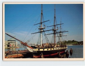 Postcard U.S.F. Constellation and the National Aquarium In Baltimore, Maryland