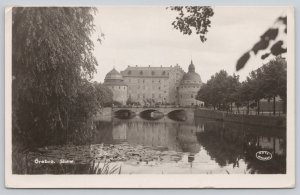 Postcard Orebro Sweden Castle River Bridge Trees 1909 RPPC View
