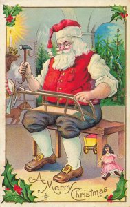 Santa Claus Smoking Pipe-Building Sled Toys~Merry Christmas-1912 Emboss POSTCARD