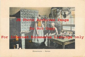 Netherlands, Marken, Binnenkamer, Woman Talking Around a Table