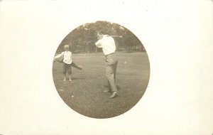 RPPC Postcard Man Golfs With Little Barefoot Boy Caddy Vignette