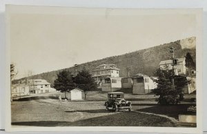 RPPC c1920s Guest House & Shacks, Mobile Homes Early Automobile Postcard Q13