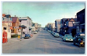 c1960 View Up Sheridan Avenue Exterior Building Ely Minnesota Vintage Postcard