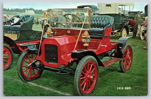 Transportation~Red 1910 Reo On Lawn Displaying Cars~Vintage Postcard