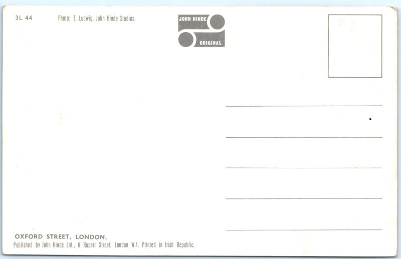 c1950s Oxford Street, London, England Selfridges Red Double Decker Buses A369