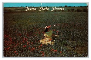 Vintage 1972 Postcard Woman Sitting in a Field of Blue Bonnet Flowers Texas