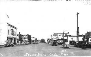 Atkins MN Store Fronts Mobil Gas Station Chevy Dealership RPPC Postcard