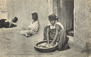 Postcard North African Black Woman Kneading Bread Dough In Wooden Bowl