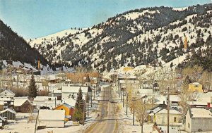 BASIN, MT Montana  SNOWY STREET SCENE~HOMES  Jefferson County Chrome Postcard