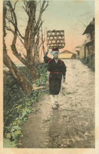 Japan Rural Road woman basket hand colored Postcard 21-9865