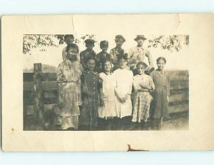 Pre-1918 rppc SIX PRETTY GIRLS IN FRONT OF THE GUYS AT THE FENCE r5879