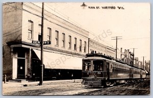 K15/ Hartford Wisconsin RPPC Postcard c1910 Main Street Troley  36
