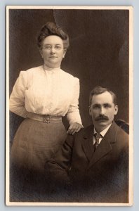 RPPC Lady in Glasses & Man  w/Thick Moustache AZO 1904-18 ANTIQUE Postcard 1533
