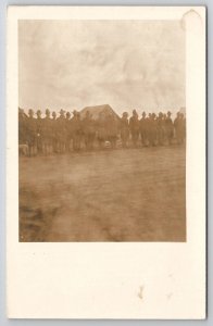 RPPC Soldiers Standing in Line with Rifles and Dog c1915 Postcard J23