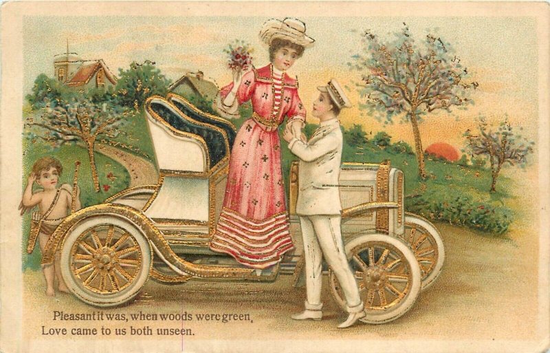 Postcard 1909 Early automobile romance Couple cupid TR24-1096