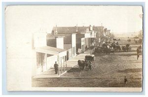 c1910 Horse Buggy Wagon Main Street Stores Dirt Road RPPC Photo Postcard