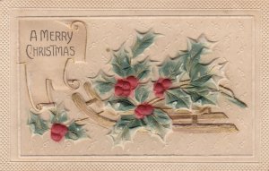 Merry Christmas Holly On Sleigh 1910 Heavily Embossed