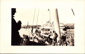 Real Photo Postcard Navy Men Working on Military Ship