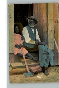 BLACK AMERICANA Old Man & Little Girl w Axe c1910 PC