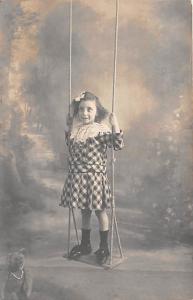 Little girl on a swing with Teddy Bear Child, People Photo Unused 