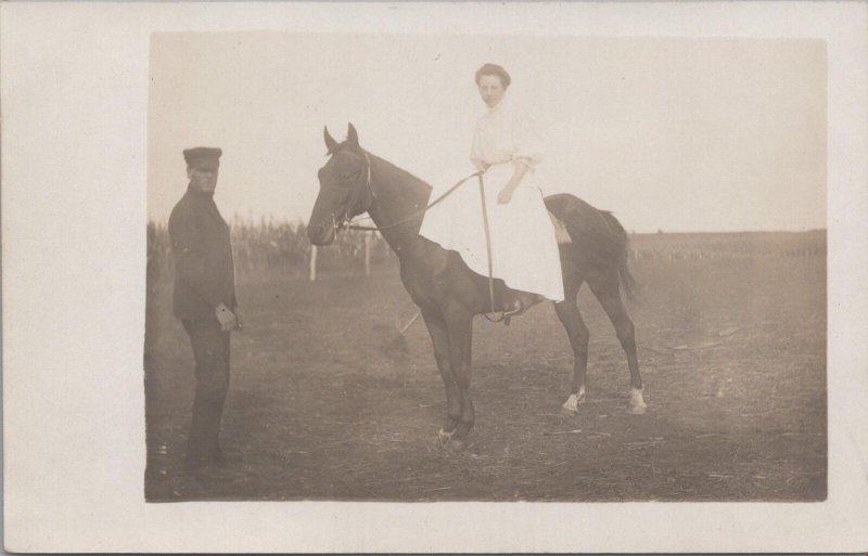 RPPC Postcard Woman White Dress Riding a Horse