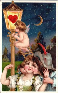 VINTAGE POSTCARD CUPID YOUNG BOY AND YOUNG GIRL STREET LAMP ELK CITY IDAHO 1908