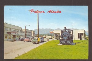 PALMER ALASKA DOWNTOWN STREET SCENE OLD CARS STORES VINTAGE POSTCARD