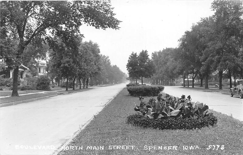 Spencer Iowa~Boulevard North Main Street~Parked Car~Flower Garden~c1930s RPPC