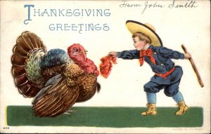 Thanksgiving Young Cowboy Lures Turkey Embossed c1900-20s Vintage Postcard
