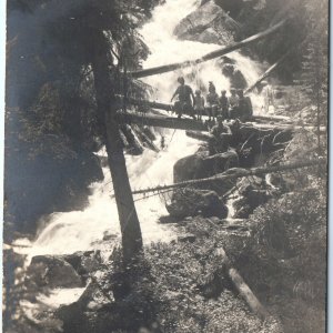 c1910s Stunning Adventurous Family RPPC Kids Danger Pose Tree Bridge Photo A161