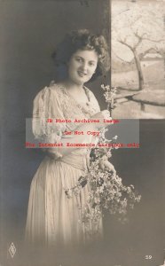 PFB RPPC No 59, Studio Shot, Pretty Woman Holding Flowers