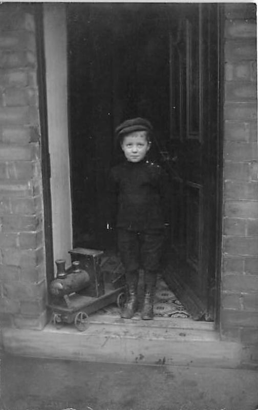 Boy with a pull toy Child, People Photo Unused 