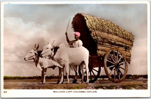 VINTAGE POSTCARD HAND-COLORED REAL PHOTO OF BULLOCK CART IN COLOMBO CEYLON 1930s