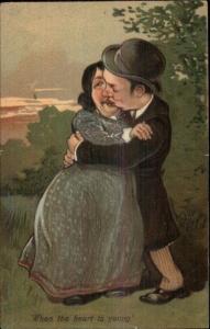 Cute/Funny Looking Couple Kissing Park PFB Embosed Postcard #1 PFB Caricature