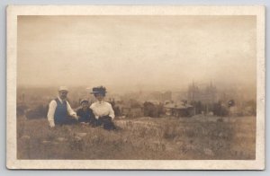 RPPC Edwardian Woman Dapper Man Son Hillside Above Town Real Photo Postcard T23