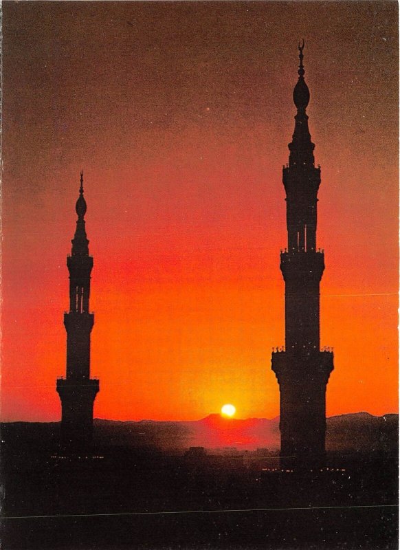 Lot342 the setting sun on the minarets mecca Saudi Arabia