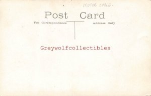 Early Motorcycle, Man Holding it, RPPC