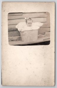 RPPC Adorable Baby in A Washtub c1910 Real Photo Postcard D27