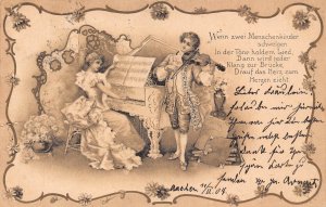 B250 Music 1904 Boy Playing Violin Girl playing Piano Flowers vintage postcard