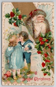Father Christmas Greetings Santa Watching Cute Little Ones Kissing Postcard N26
