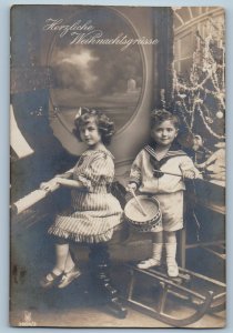 c1910's Christmas Children Playing Piano Drummer RPPC Photo Antique Postcard