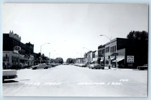 Beresford SD Postcard RPPC Photo Third Street Drugs Store Bakery Cars c1930's