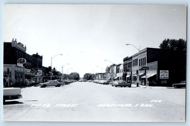 Beresford SD Postcard RPPC Photo Third Street Drugs Store Bakery Cars c1930's