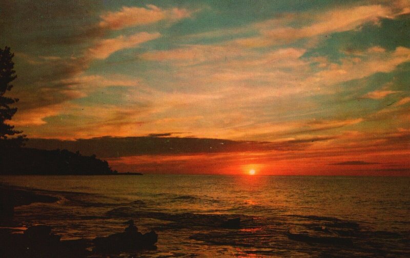 Vintage Postcard Scene of Ocean as the Sun Sets in the Evening Lusterchrome