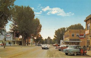 Choteau Montana Business District Rexall Drug Store Vintage Postcard AA56227