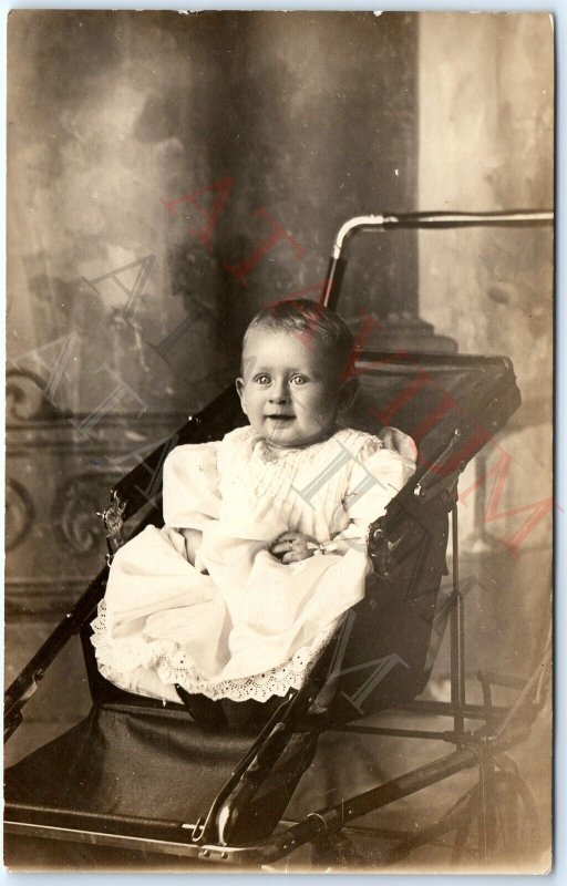 ID'd c1910s Cute Smile Baby Boy RPPC Stroller Fun Photo Arthur Roger Rodden A161