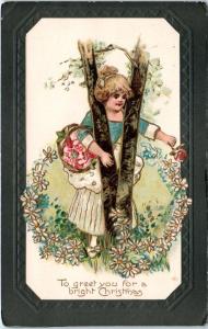 CHRISTMAS GREETING Embossed GIRL w/Basket Between 2 TREE BRANCHES 1909 Postcard