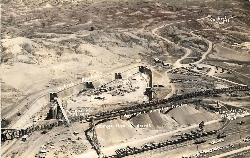 c1930s RPPC Annotated Air View Construction Fort Peck Dam Glasgow MT Valley Art