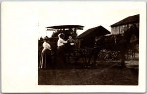 Photograph of Women In A Horse Carriage RPPC Real Photo Postcard