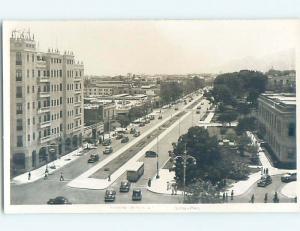 old rppc OLD CARS AND SHOPS ALONG THE STREET Lima Peru HM2247